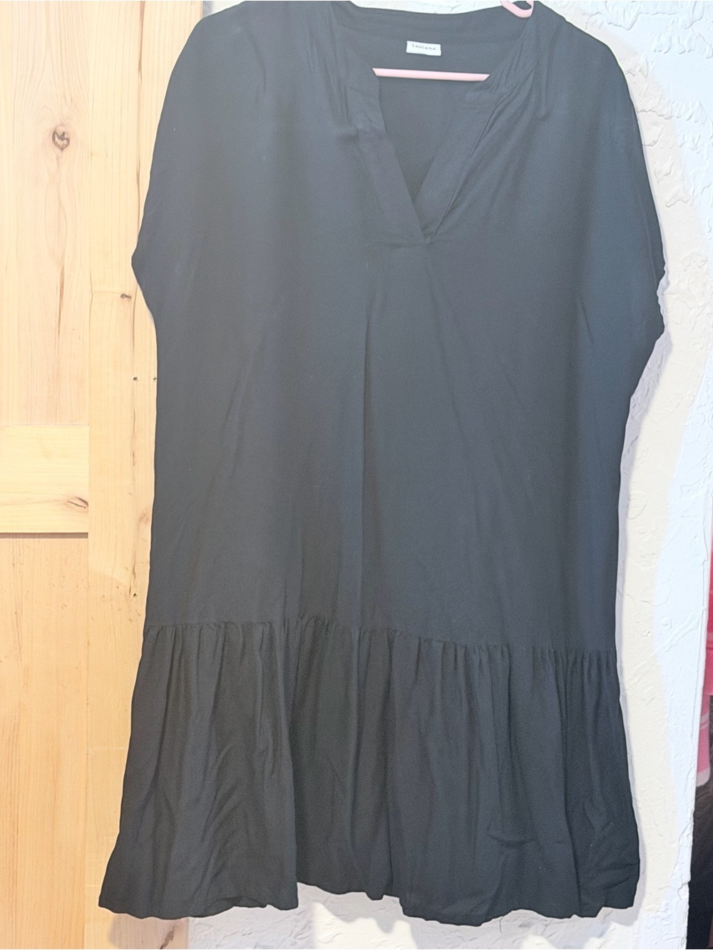 Classic Black V-Neck Ruffle-Hem Tunic Top
